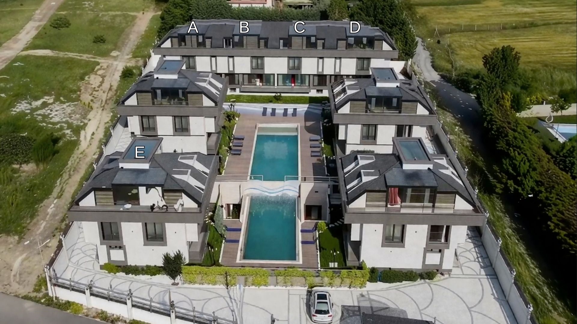 Aerial view of 8 premium villas compound layout in Beylikdüzü Istanbul with pool areas and landscaped gardens
